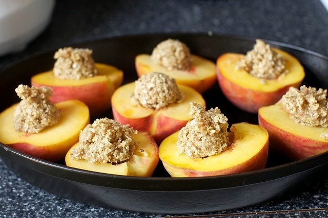 dollop almond crisp in peach bellies